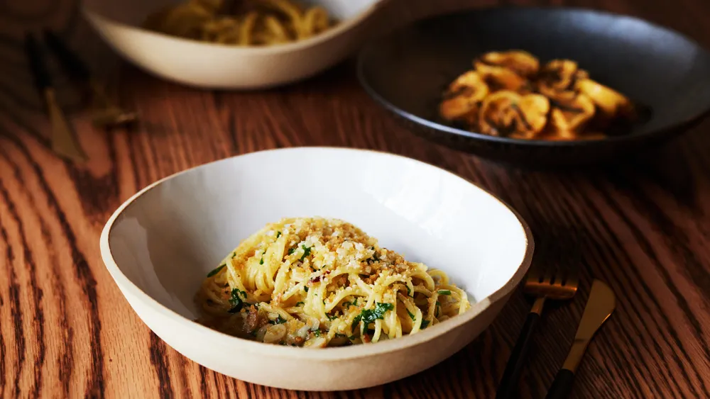 iggy’s signature dishes Cacio e Pepe, Tagliatelle with Pork Ragu, Ricotta Pillows, Focaccia